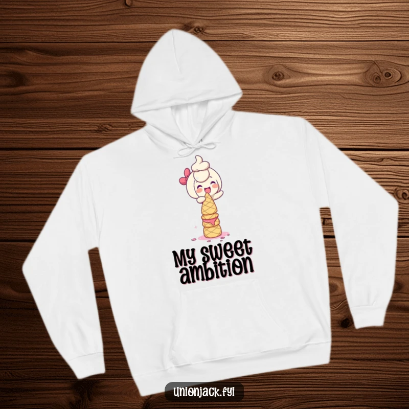Funny Hoodie: Character giggling while balancing a large tower of scones, perfect for cozying up with a sweet and humorous baking theme.